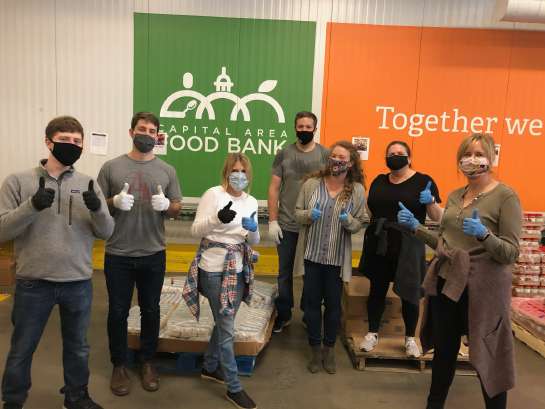 Team volunteering at the Capital Area Food Bank